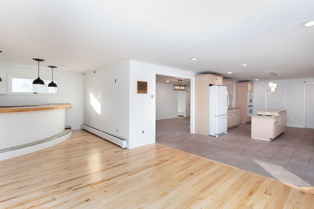 36 Intervale Road Worcester, MA 01602 - Photo 10 of 31 a view of a kitchen with a sink and a refrigerator