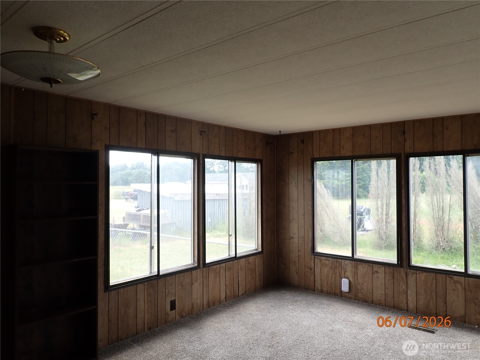 9217 183rd Avenue Southwest Rochester, WA 98579 - Photo 14 of 26 a view of an empty room with a window
