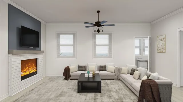 a living room with furniture a fireplace and a flat screen tv