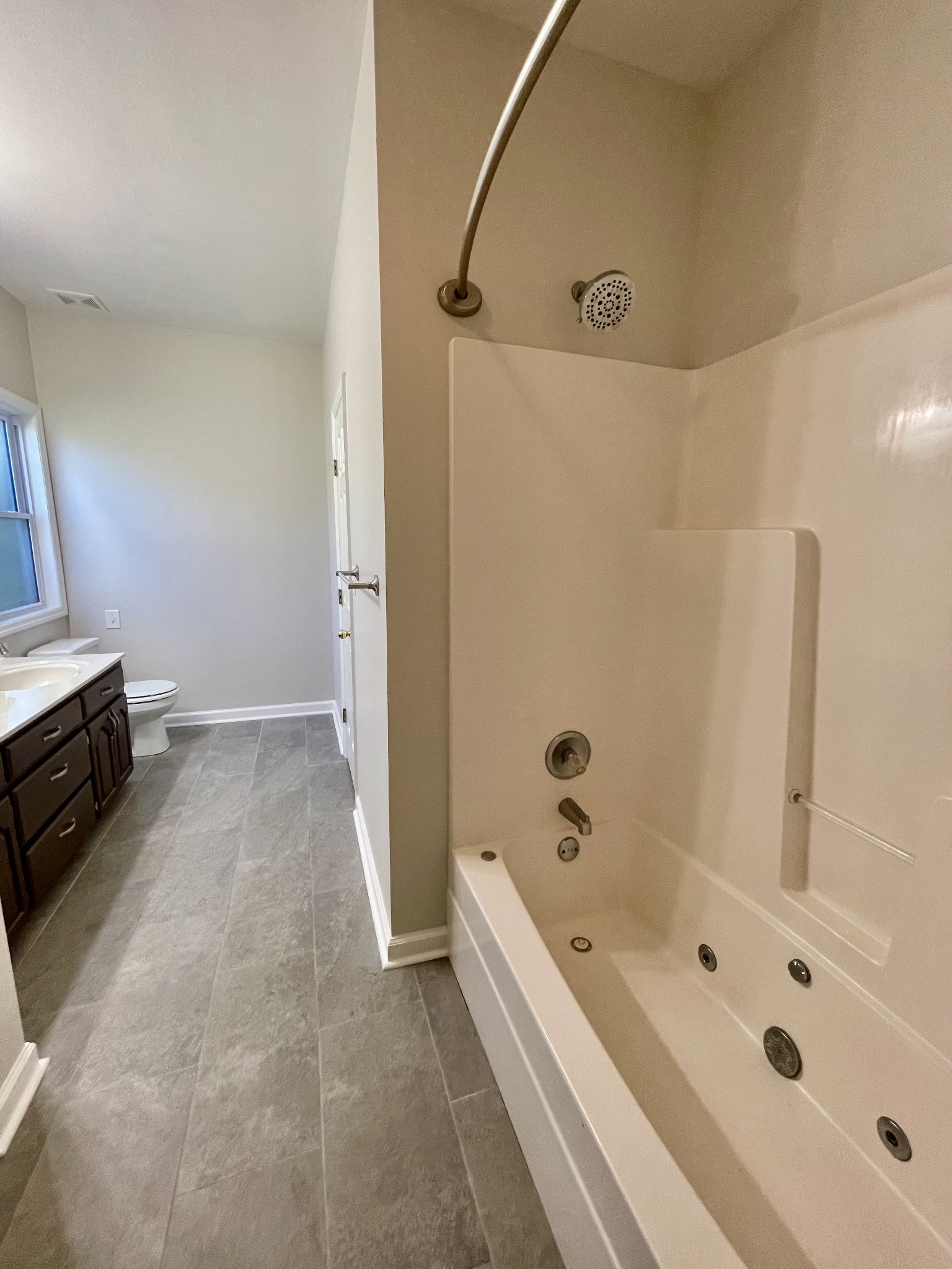 40 Harding Road Leoma, TN 38468 - Photo 18 of 35 a bathroom with a bathtub and a shower