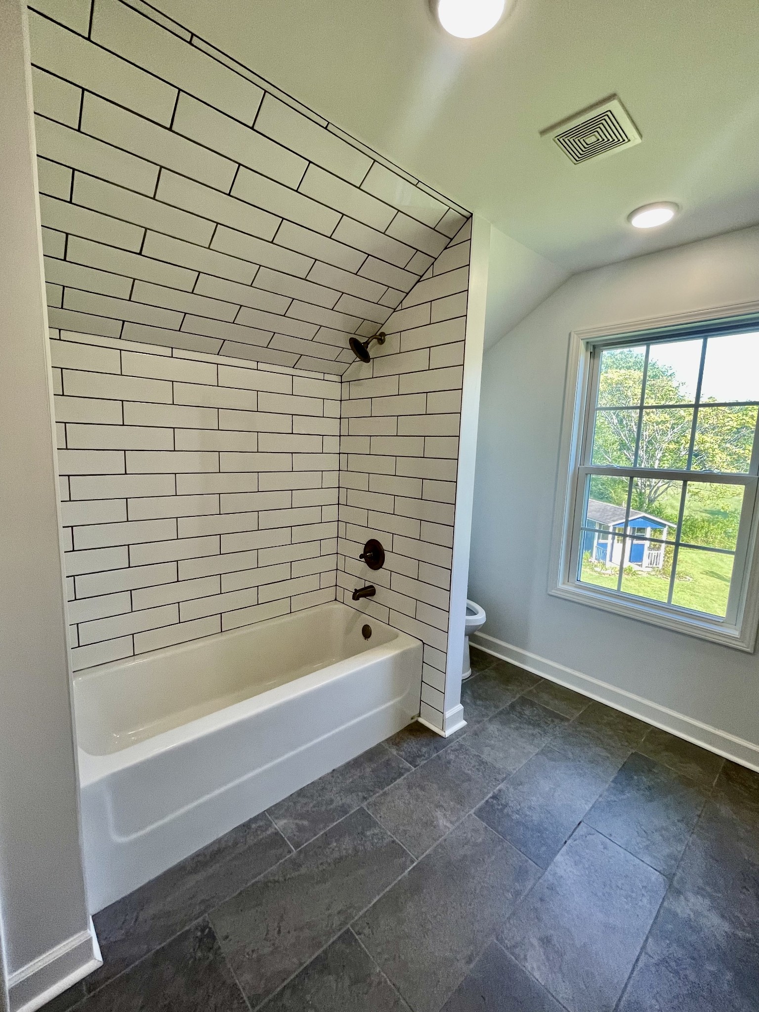 40 Harding Road Leoma, TN 38468 - Photo 31 of 35 a bathroom with a bathtub and shower