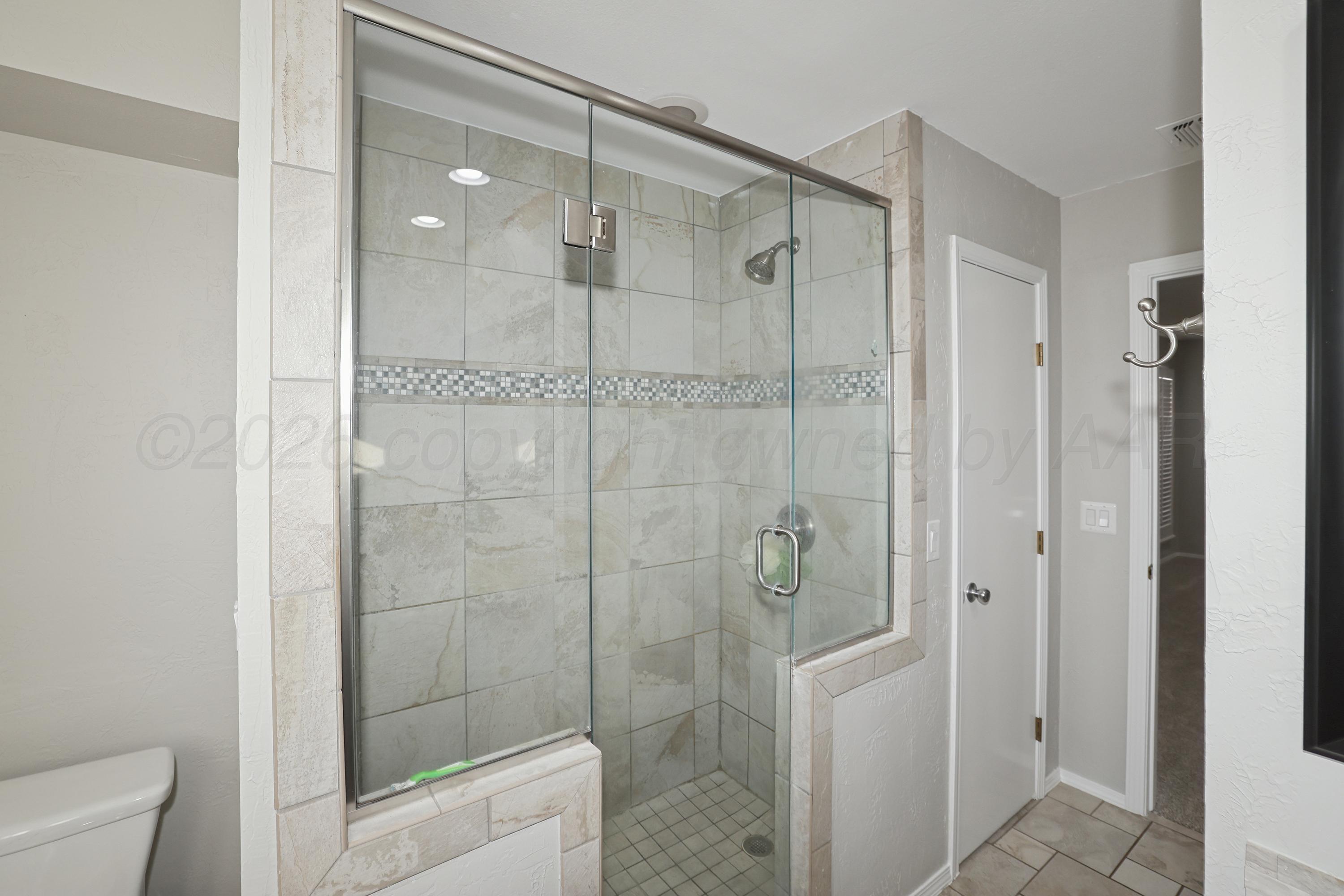 7609 Poppin Lane Amarillo, TX 79121 - Photo 21 of 34 22-Primary Bath Shower