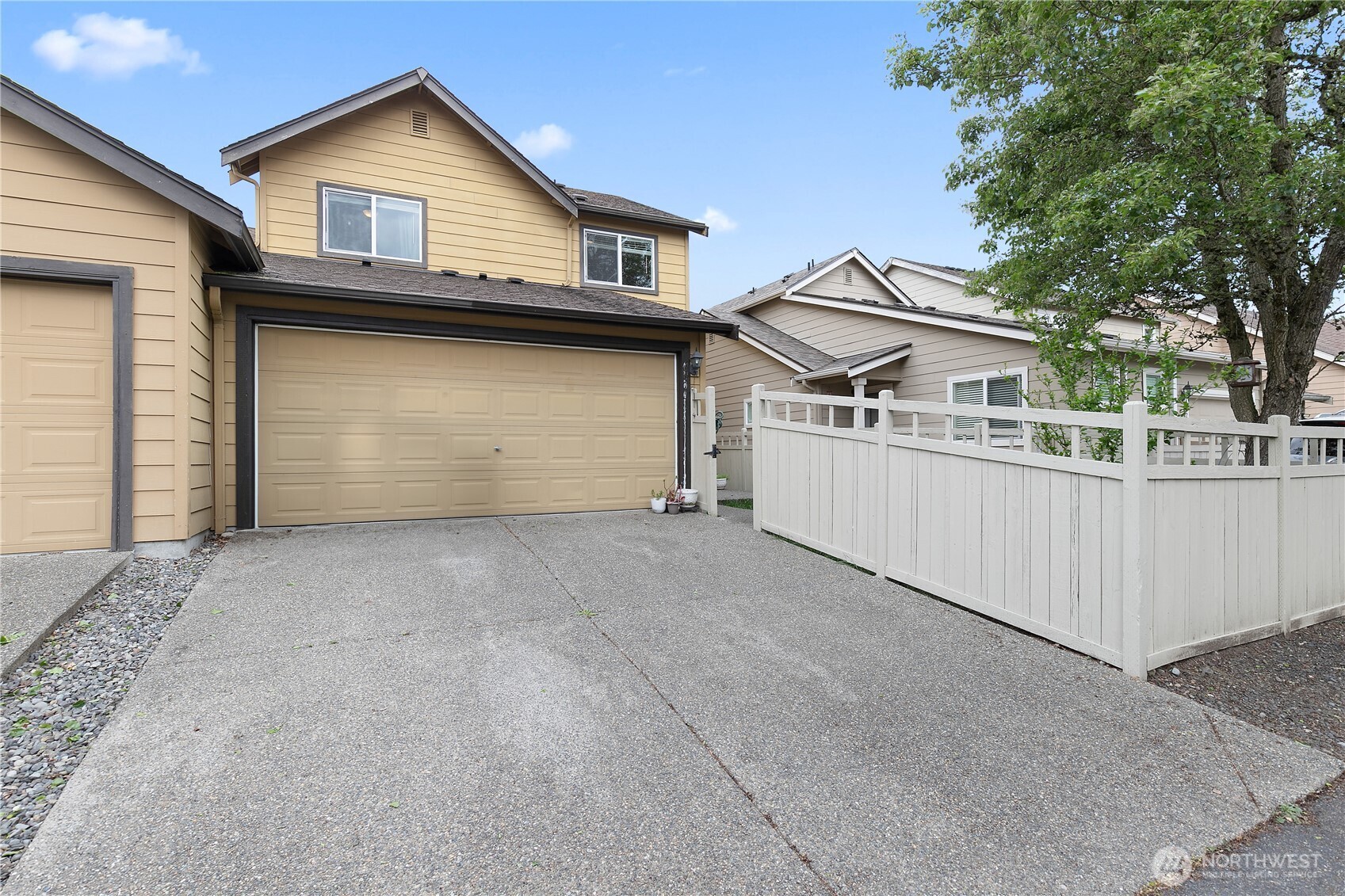 6600 Indiana Street Southeast Lacey, WA 98513 - Photo 21 of 21 a front view of a house with garage