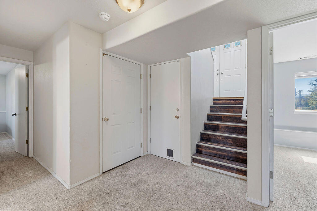 2979 Northeast Sugar Pine Road Prineville, OR 97754 - Photo 12 of 31 a view of an empty room with stairs
