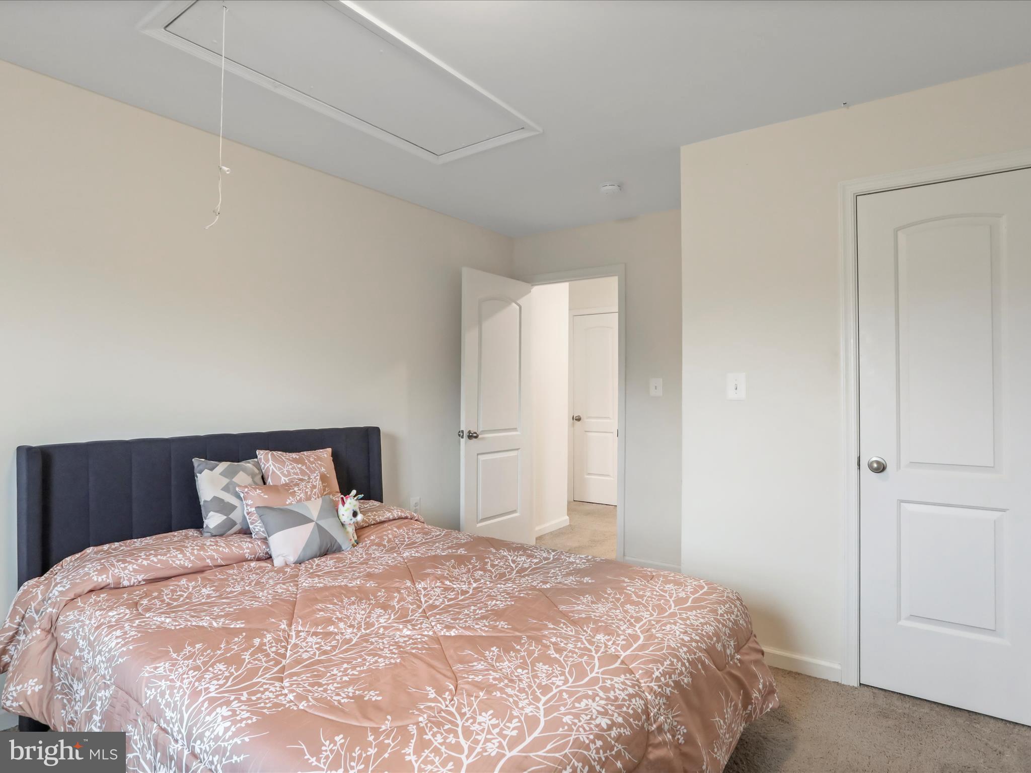 208 Rappahannock Run Falling Waters, WV 25419 - Photo 22 of 44 a bedroom with a bed and a closet