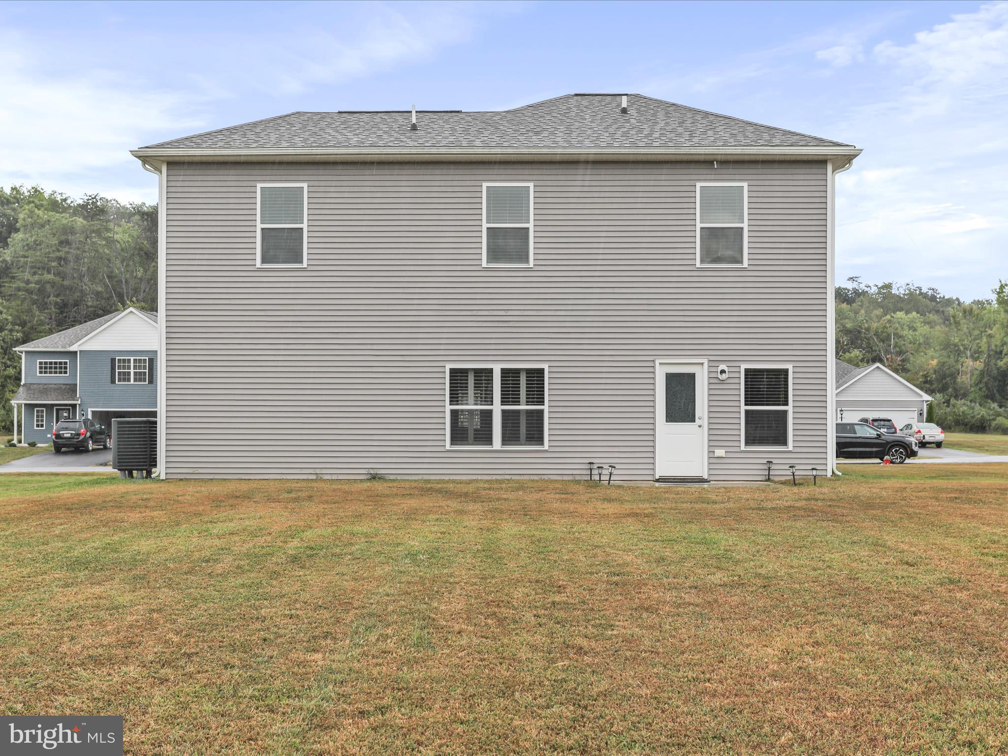 208 Rappahannock Run Falling Waters, WV 25419 - Photo 28 of 44 a view of a house with a yard