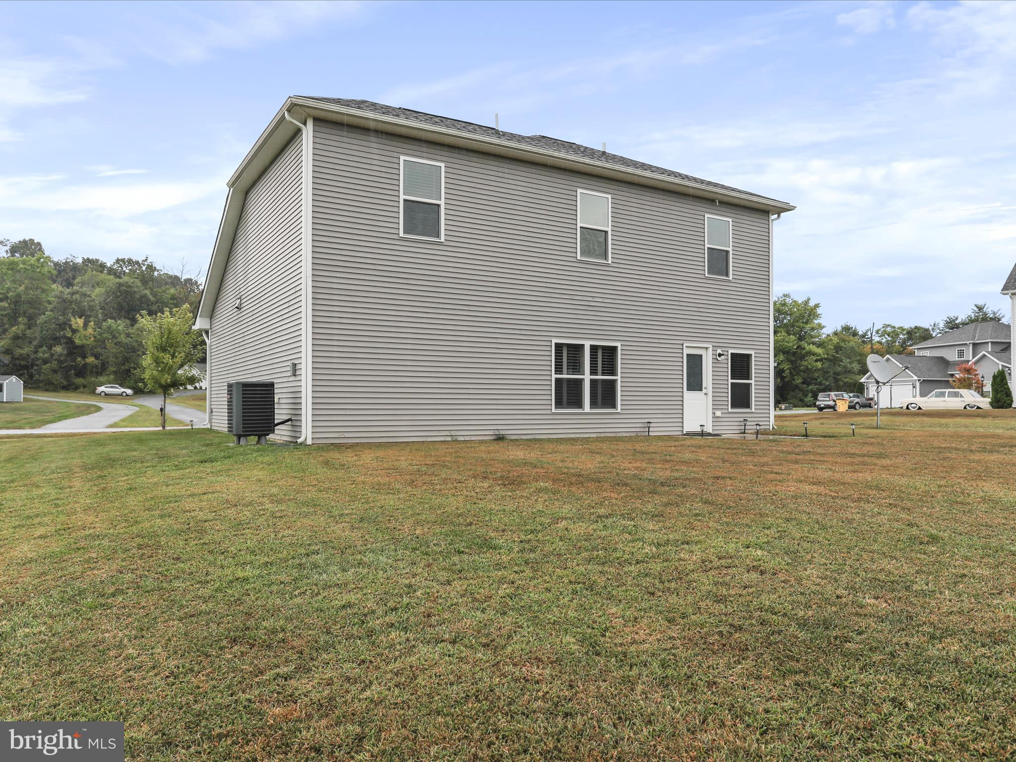 208 Rappahannock Run Falling Waters, WV 25419 - Photo 30 of 44 a house view with a backyard space