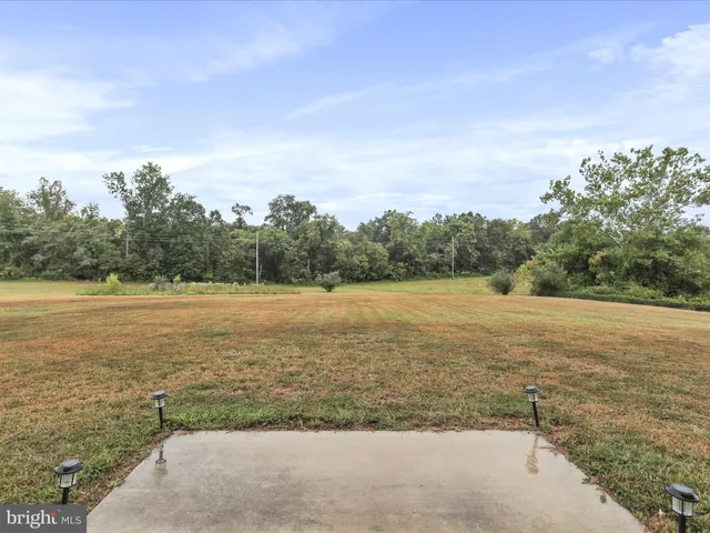 a view of an outdoor space and a yard