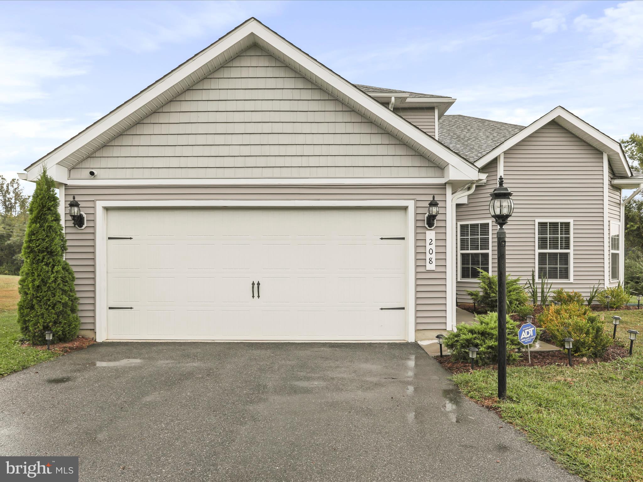 208 Rappahannock Run Falling Waters, WV 25419 - Photo 36 of 44 a view of a house with garage