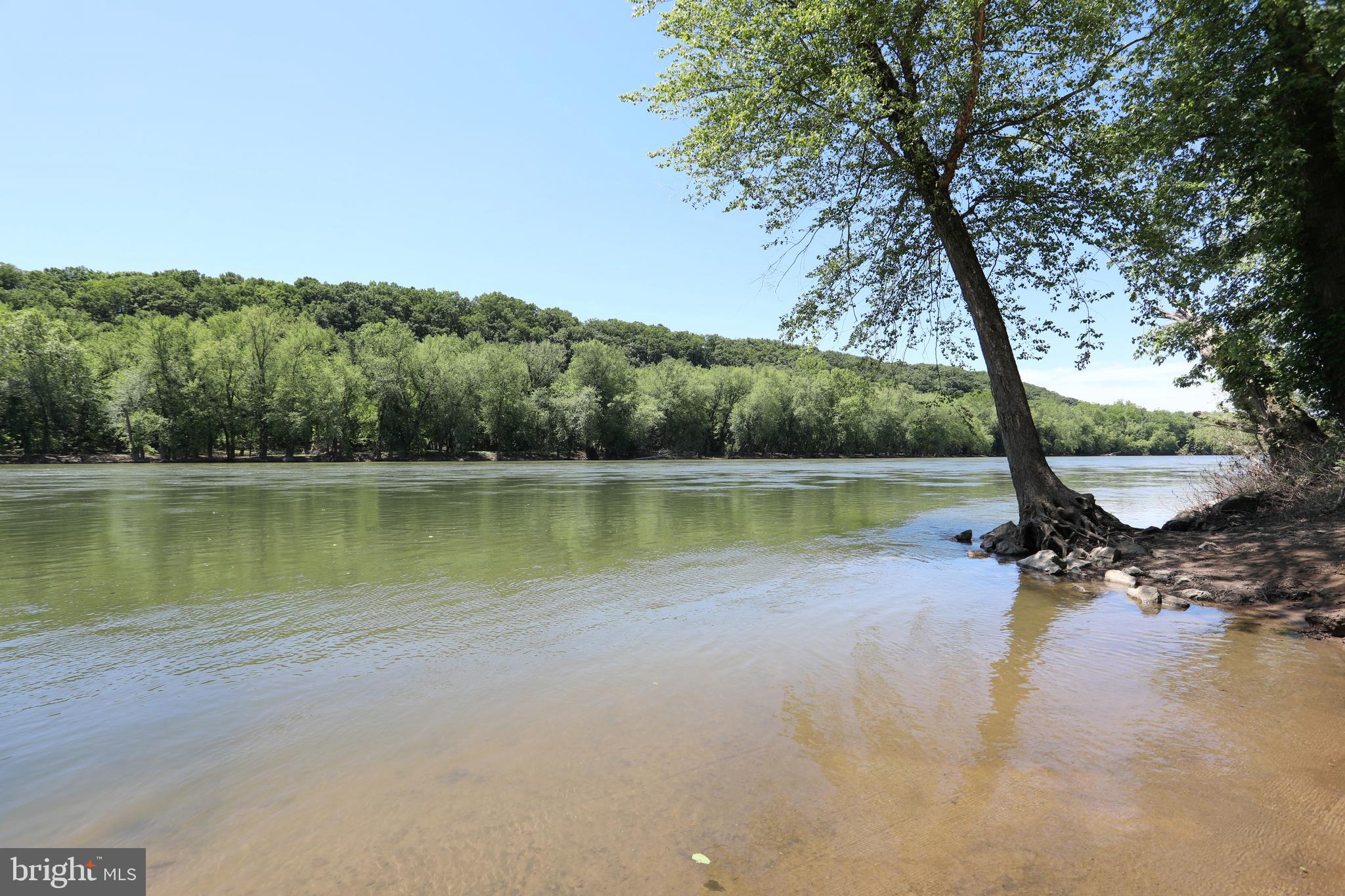 208 Rappahannock Run Falling Waters, WV 25419 - Photo 41 of 44 a view of a lake with a mountain