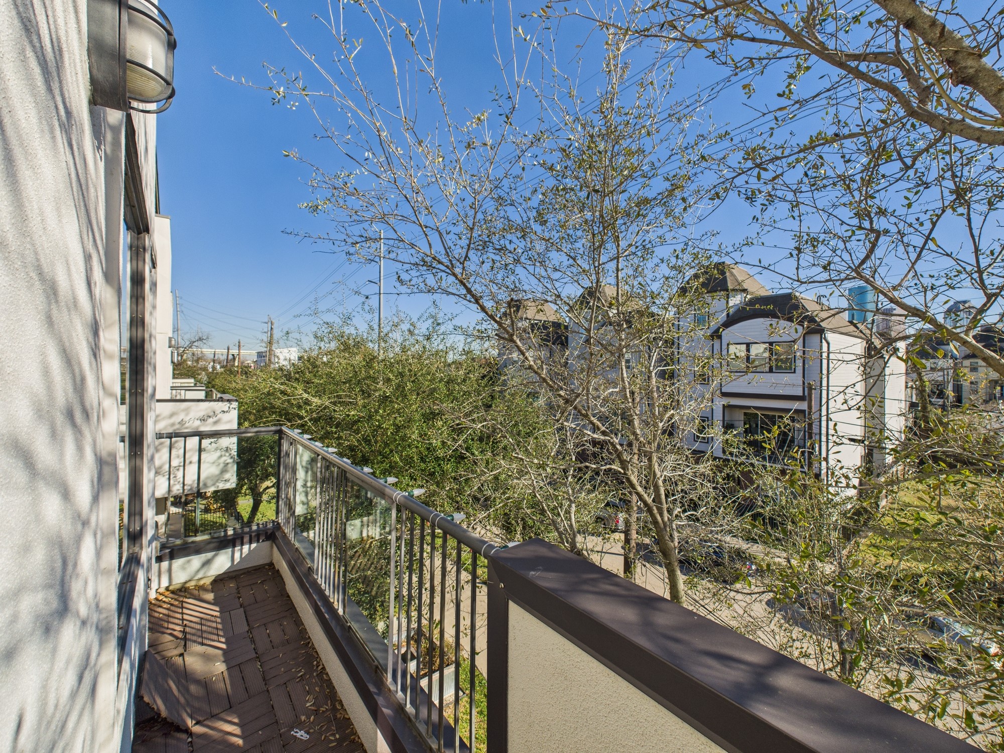 1404 Spring Street, Unit A Houston, TX 77007 - Photo 32 of 47 Juliet balcony off the primary bedroom