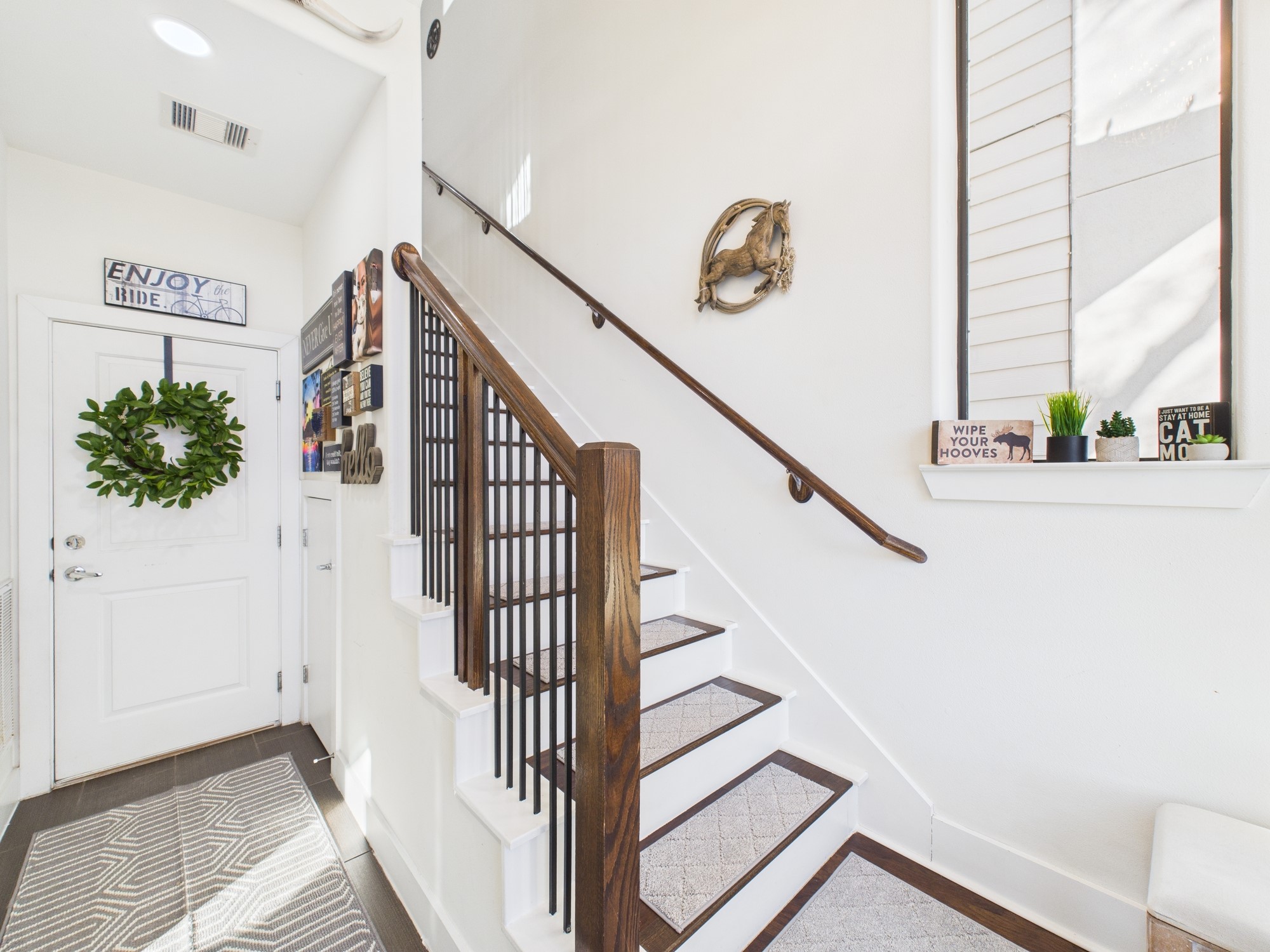 1404 Spring Street, Unit A Houston, TX 77007 - Photo 10 of 47 Garage Entry with some additional under the stairs storage