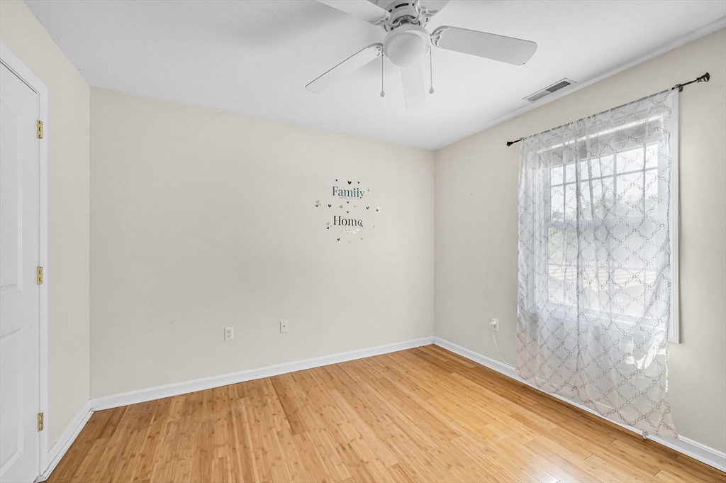 31 Acrebrook Road Springfield, MA 01129 - Photo 31 of 42 a view of empty room with wooden floor and fan