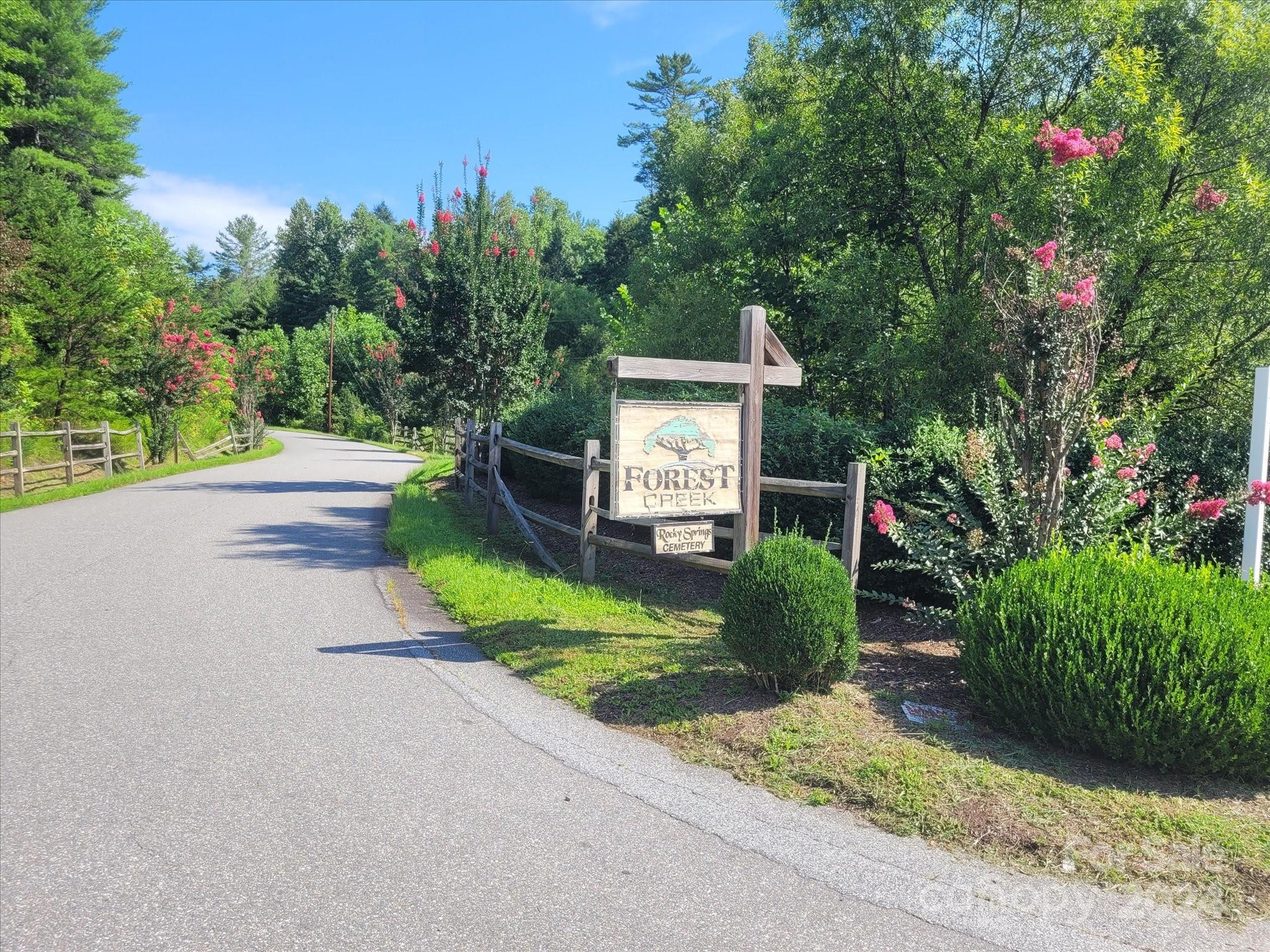 0 Tomahawk Ridge Drive Lenoir, NC 28645 - Photo 12 of 13 a front view of a house with garden
