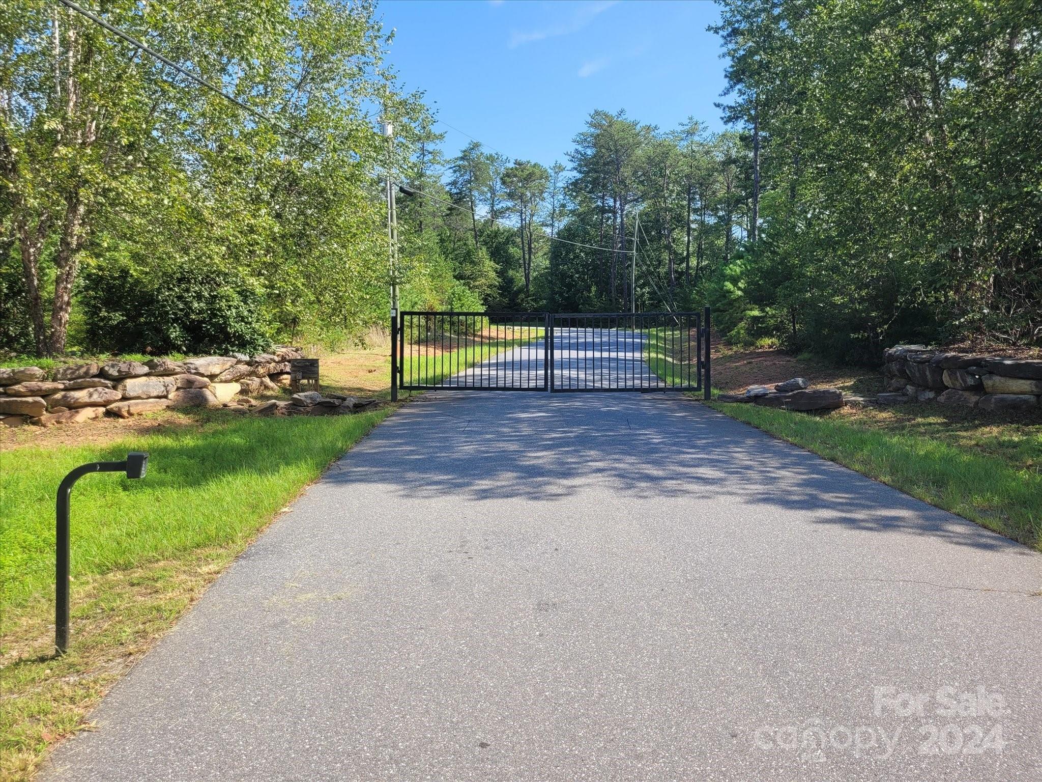 0 Tomahawk Ridge Drive Lenoir, NC 28645 - Photo 13 of 13 a view of a park with large trees