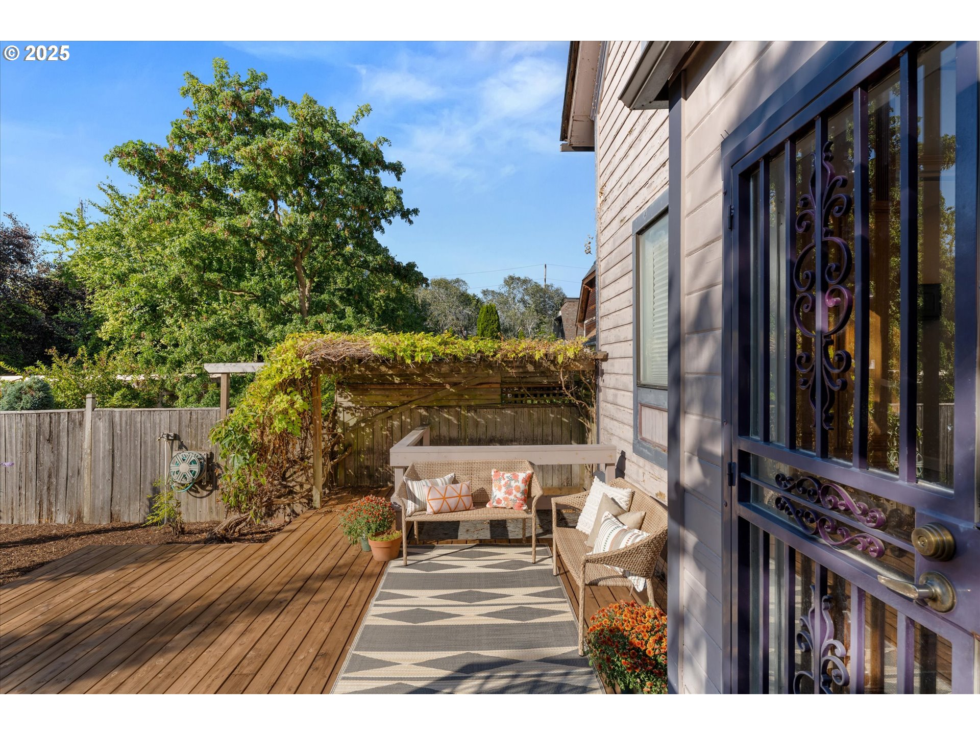3635 South Corbett Avenue Portland, OR 97239 - Photo 22 of 30 a view of balcony with wooden floor and outdoor seating