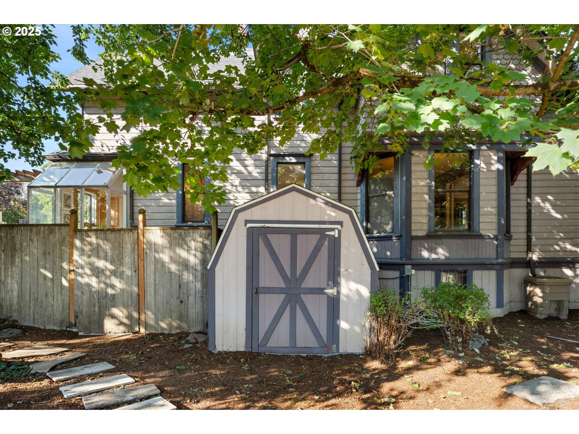 3635 South Corbett Avenue Portland, OR 97239 - Photo 29 of 30 a front view of a house with a yard