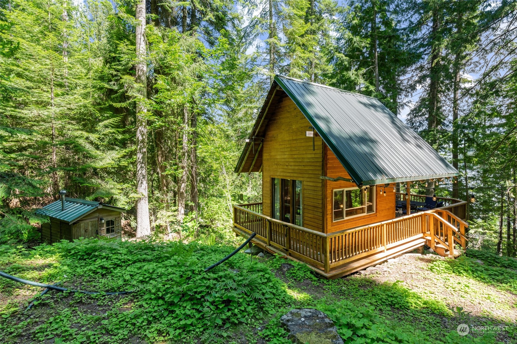 15869 Cedar Brae Road Leavenworth, WA 98826 - Photo 14 of 19 a view of backyard with deck and trees