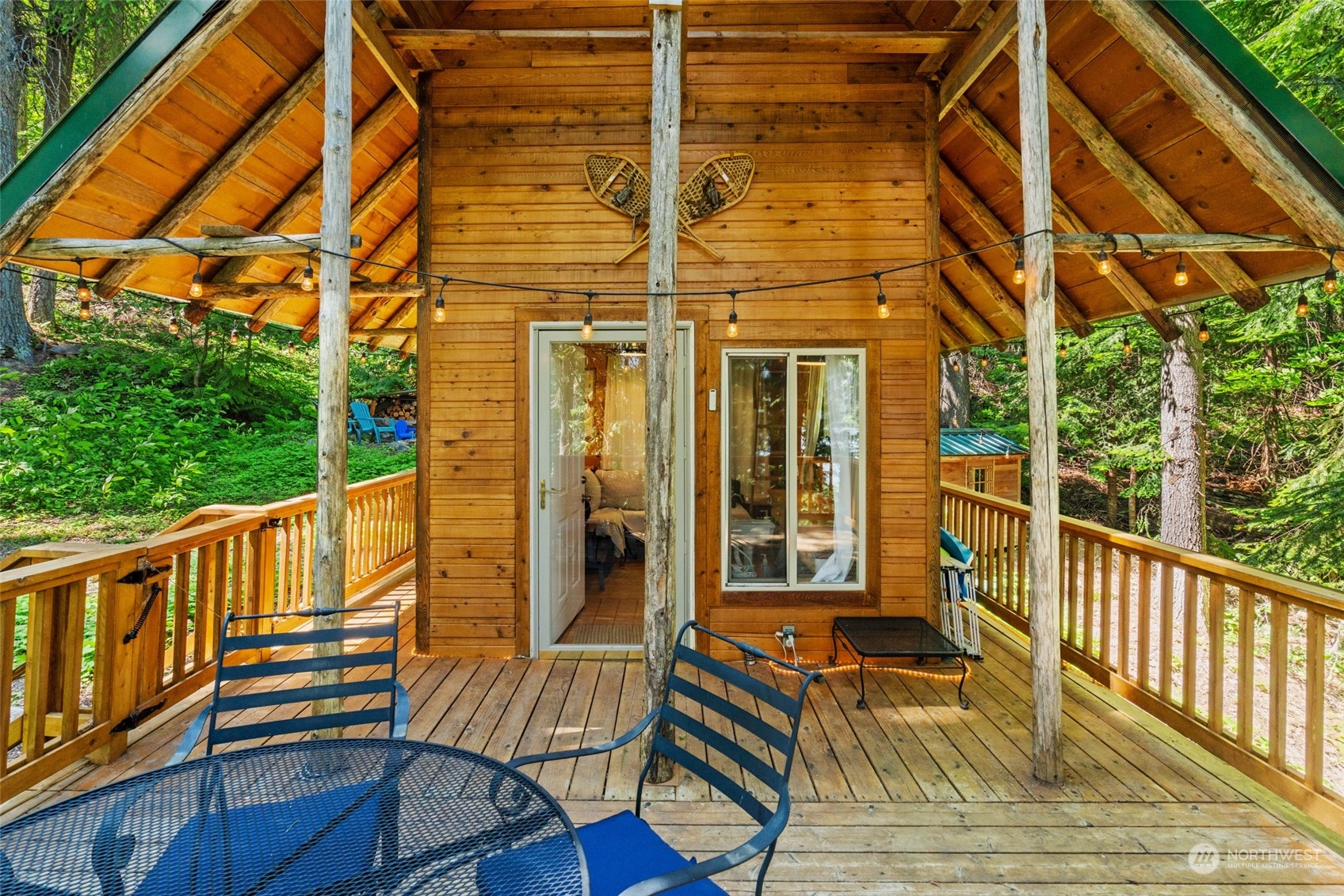15869 Cedar Brae Road Leavenworth, WA 98826 - Photo 3 of 19 a view of a chairs on the roof deck