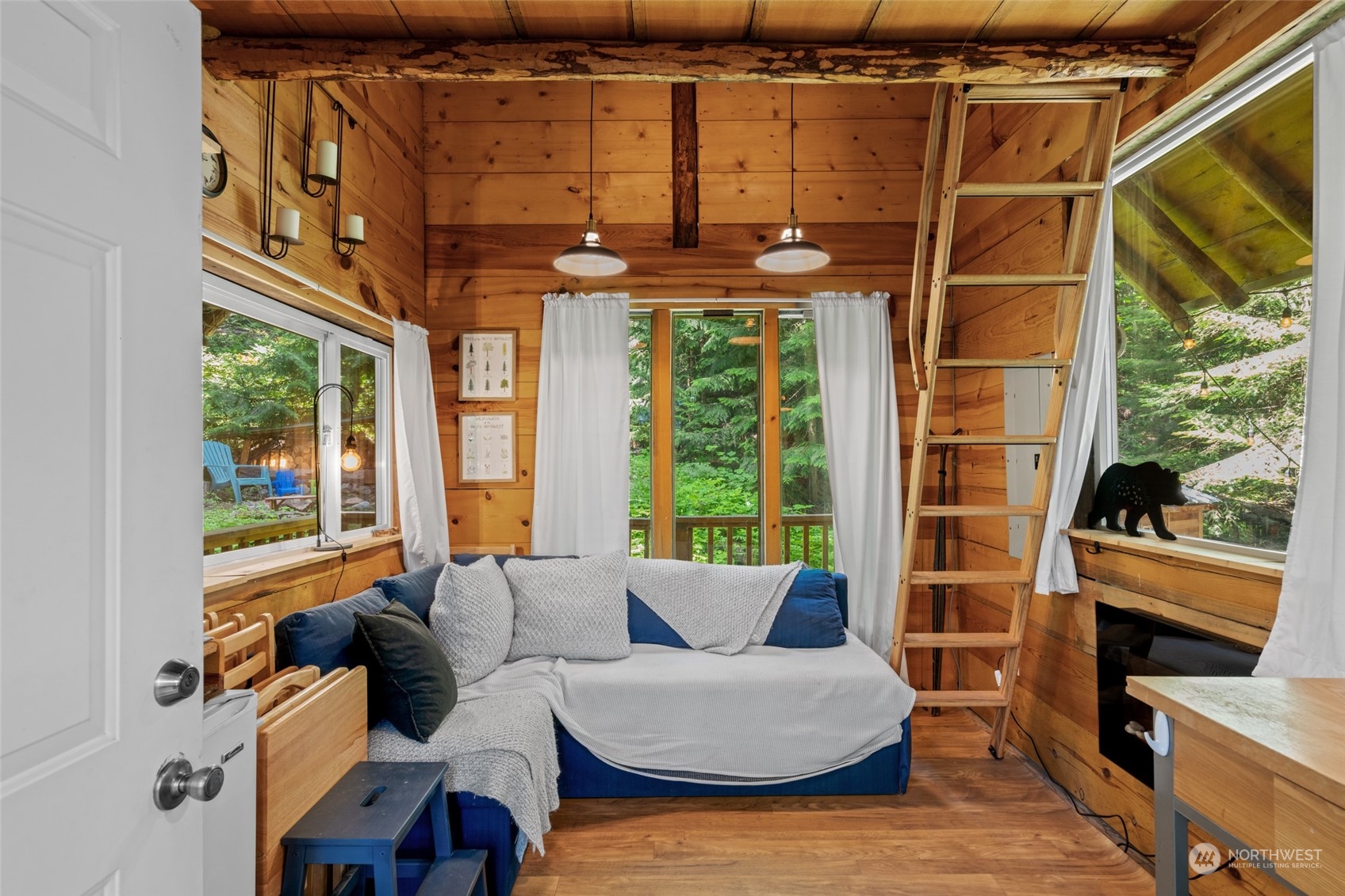 15869 Cedar Brae Road Leavenworth, WA 98826 - Photo 4 of 19 a living room with furniture and a window