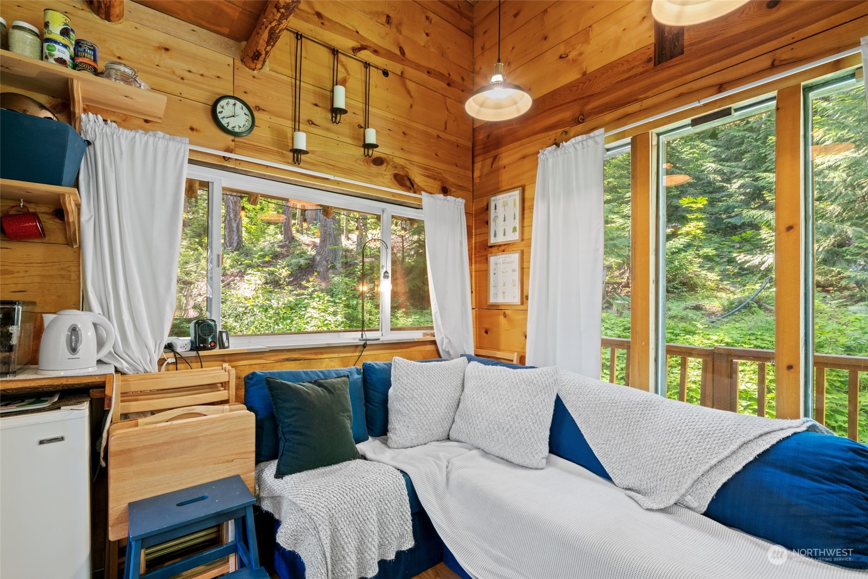 15869 Cedar Brae Road Leavenworth, WA 98826 - Photo 8 of 19 a living room with furniture and a window