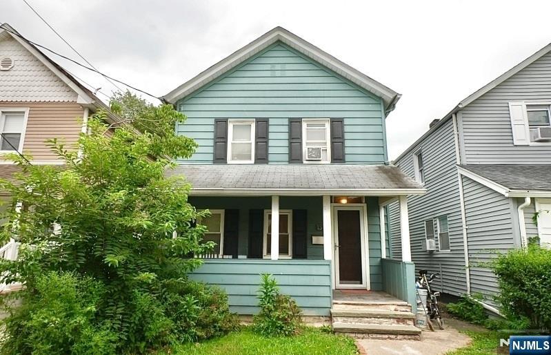 front view of a house and a yard