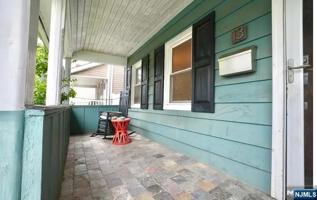 a backyard of a house with seating space