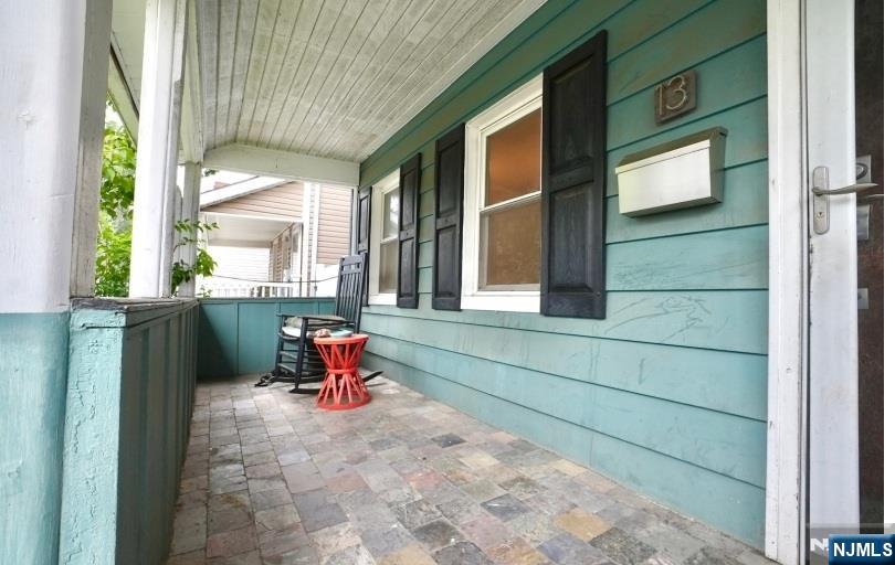 13 Thomas Street Bloomfield, NJ 07003 - Photo 17 of 18 a backyard of a house with seating space