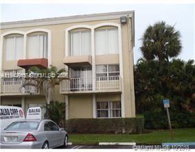 a front view of a house with balcony