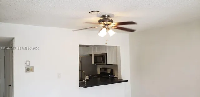 a picture of a bathroom with a sink and a mirror