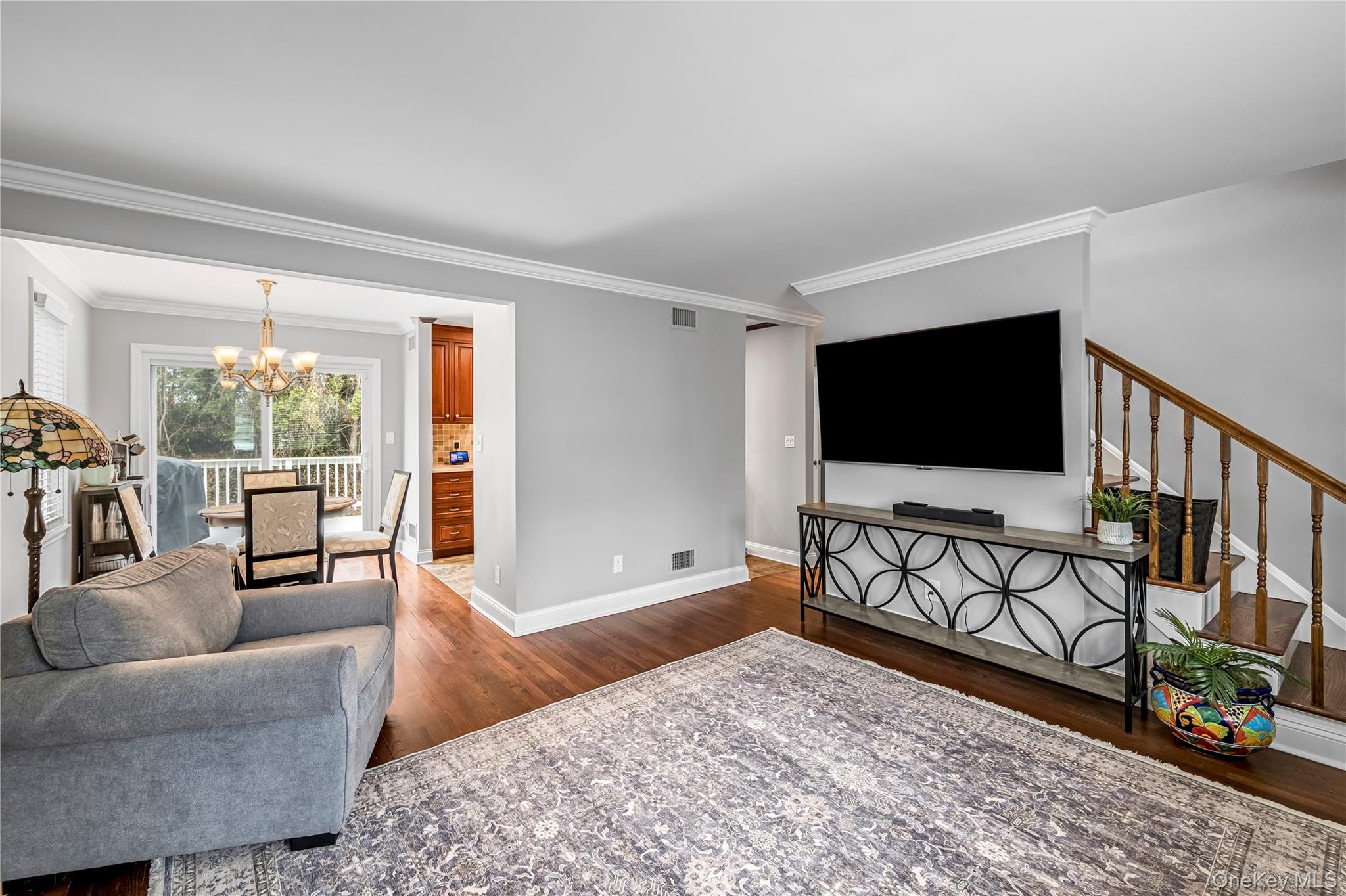40 Wickford Road New Rochelle, NY 10801 - Photo 13 of 32 a living room with furniture and a flat screen tv