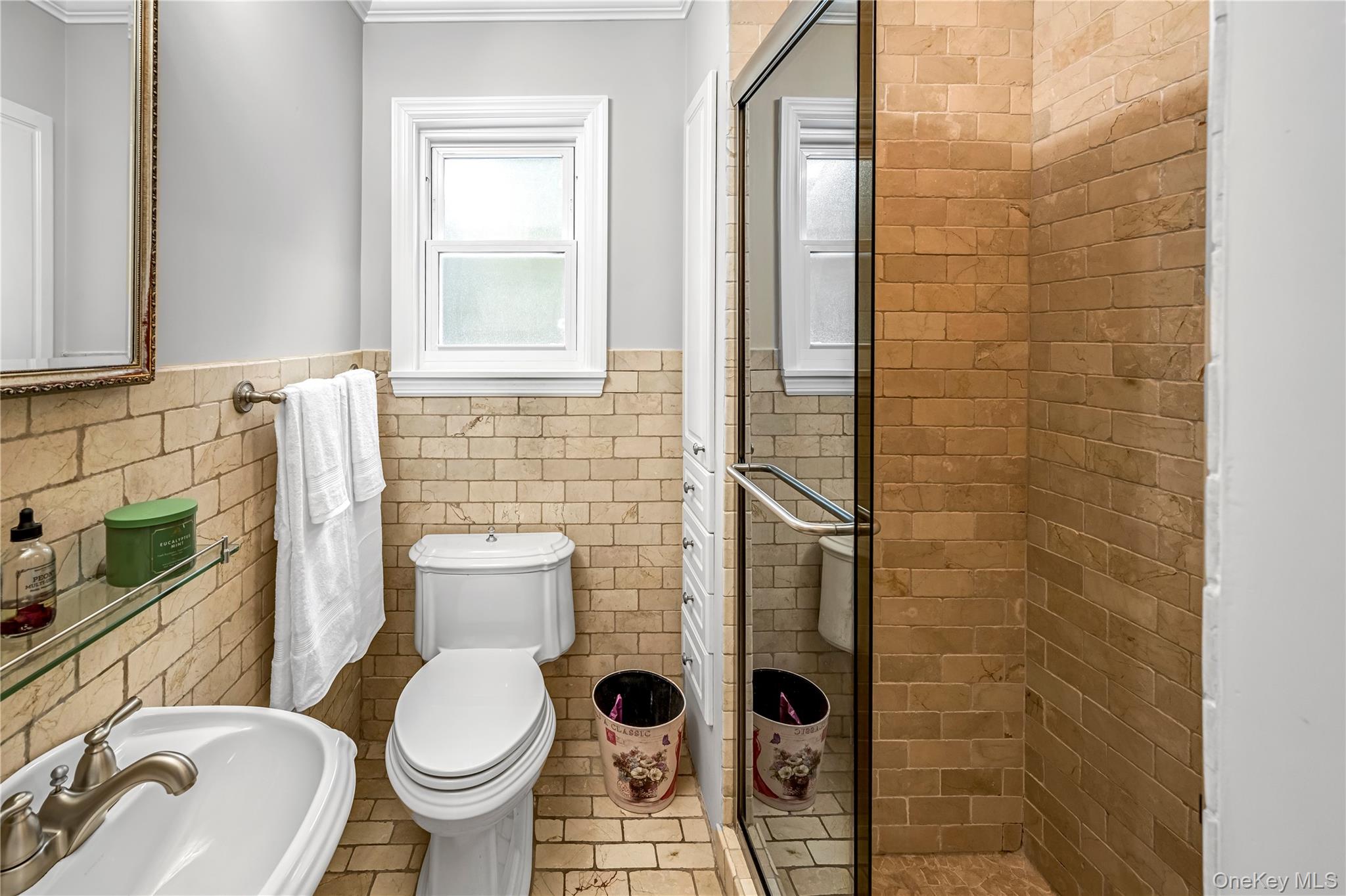 40 Wickford Road New Rochelle, NY 10801 - Photo 14 of 32 a bathroom with a toilet and a sink