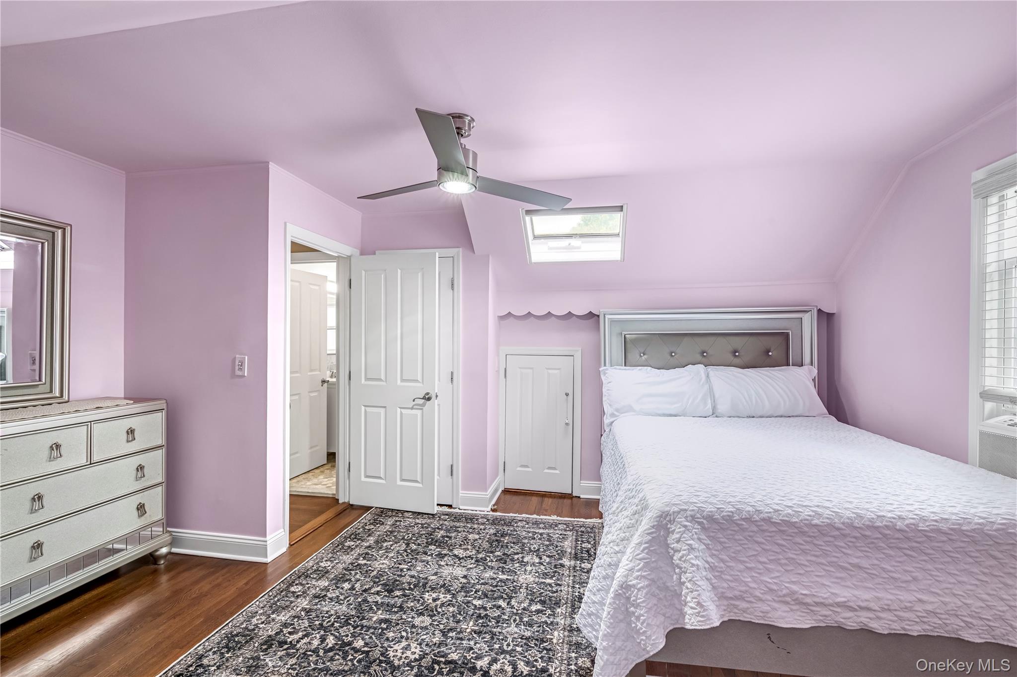 40 Wickford Road New Rochelle, NY 10801 - Photo 24 of 32 a bedroom with a bed and a dresser