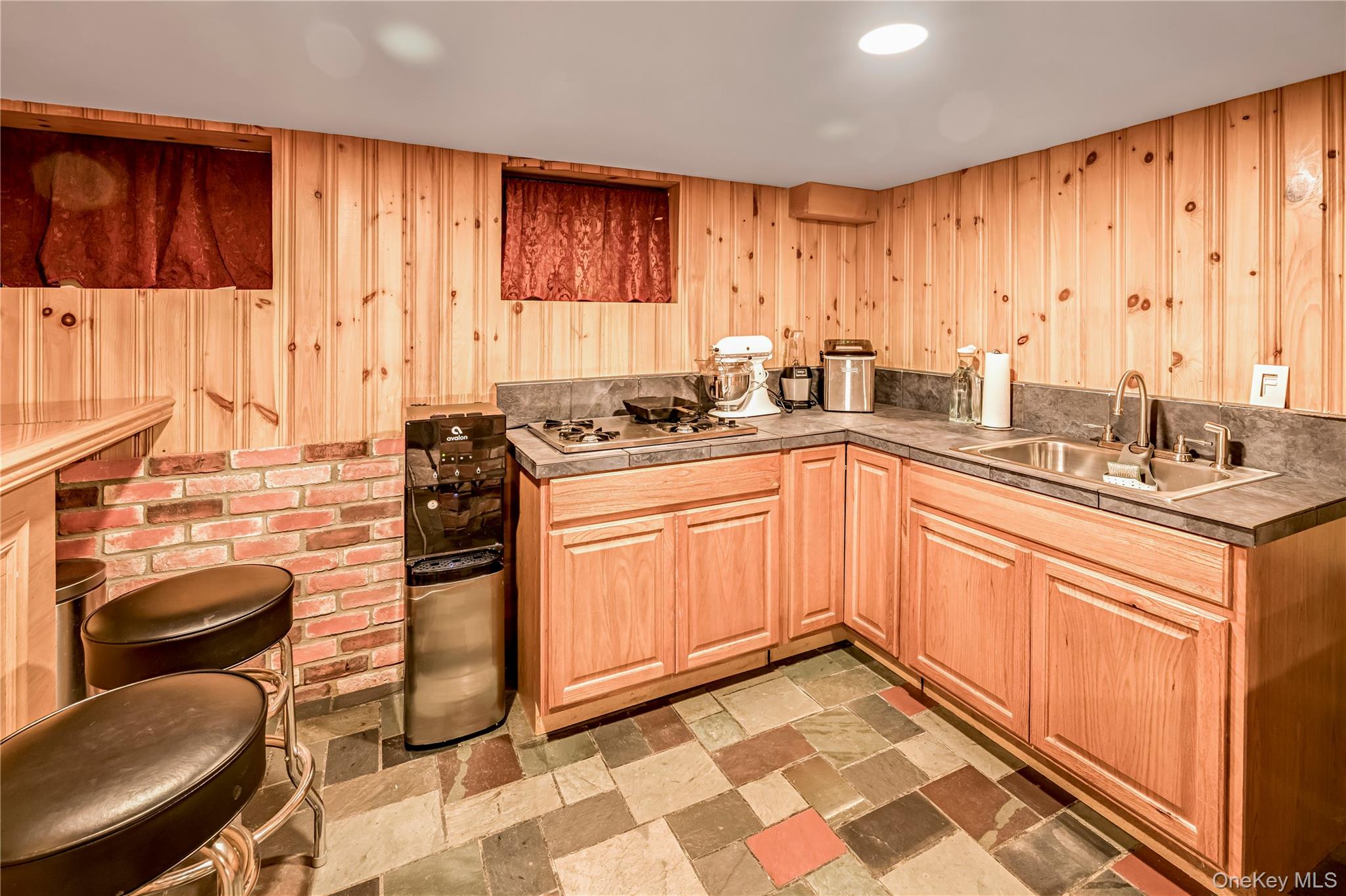 40 Wickford Road New Rochelle, NY 10801 - Photo 28 of 32 a kitchen with stainless steel appliances granite countertop a sink stove and cabinets