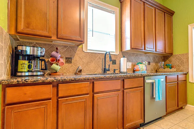a bathroom with a sink toilet and a mirror