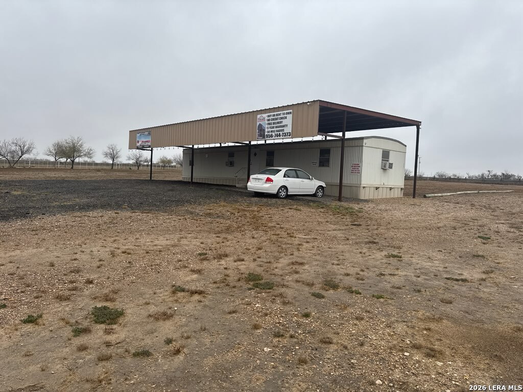 2265 Ih 35 Encinal, TX 78019 - Photo 3 of 6 a view of a house with backyard