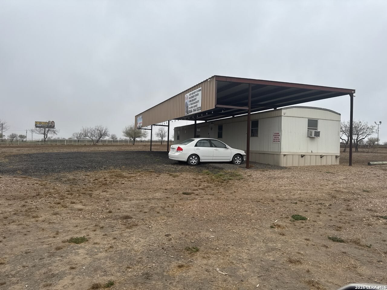 2265 Ih 35 Encinal, TX 78019 - Photo 4 of 6 a car parked in front of house