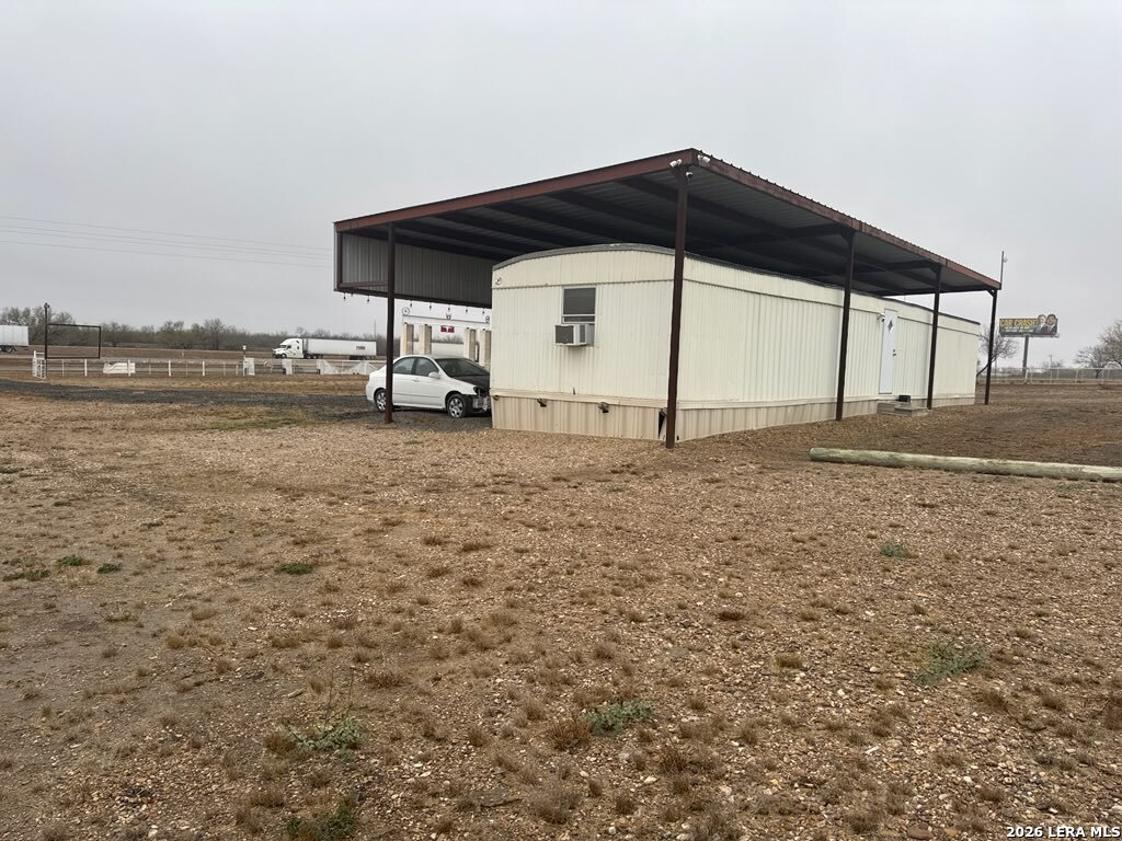 2265 Ih 35 Encinal, TX 78019 - Photo 5 of 6 a big house with a yard