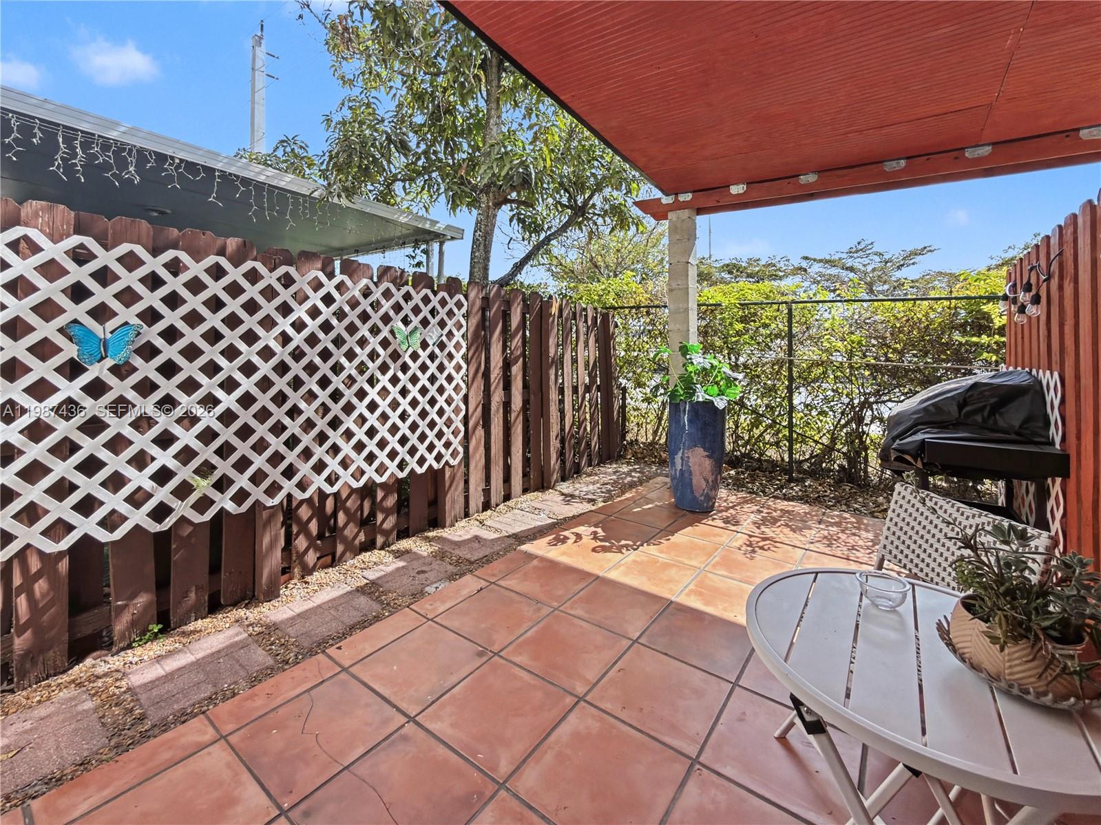 16004 Southwest 87th Terrace Miami, FL 33193 - Photo 25 of 30 a view of a patio