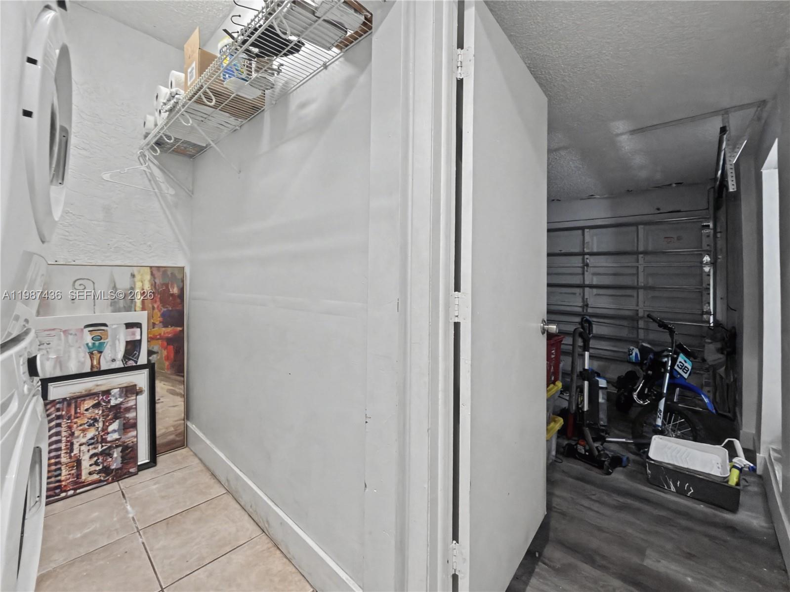 16004 Southwest 87th Terrace Miami, FL 33193 - Photo 4 of 30 a view of a hallway with closet