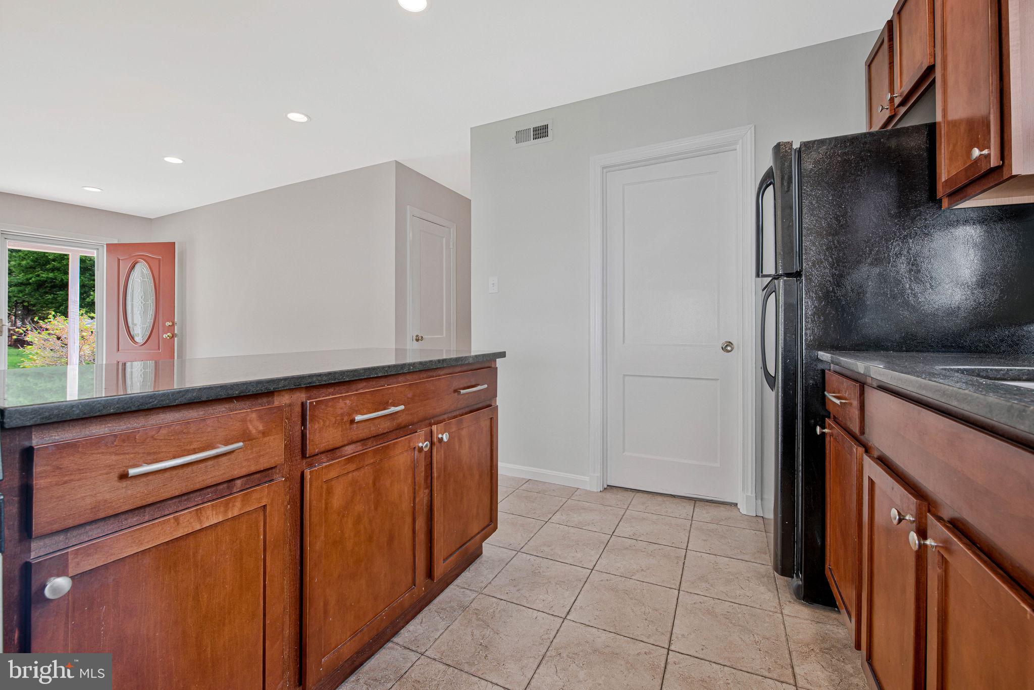 5007 Somerset Road Riverdale, MD 20737 - Photo 9 of 32 Kitchen with ceramic tile flooring