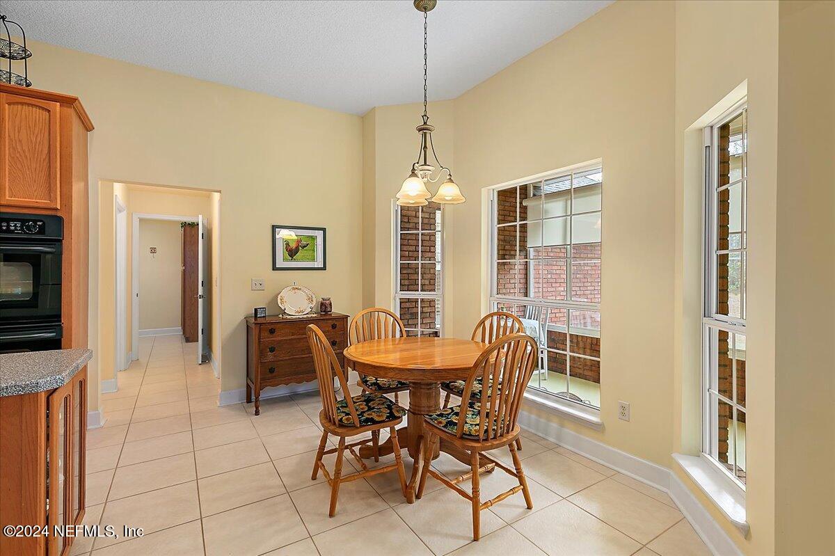 9058 Butcher Road Glen St. Mary, FL 32040 - Photo 18 of 43 a dining room with furniture and window