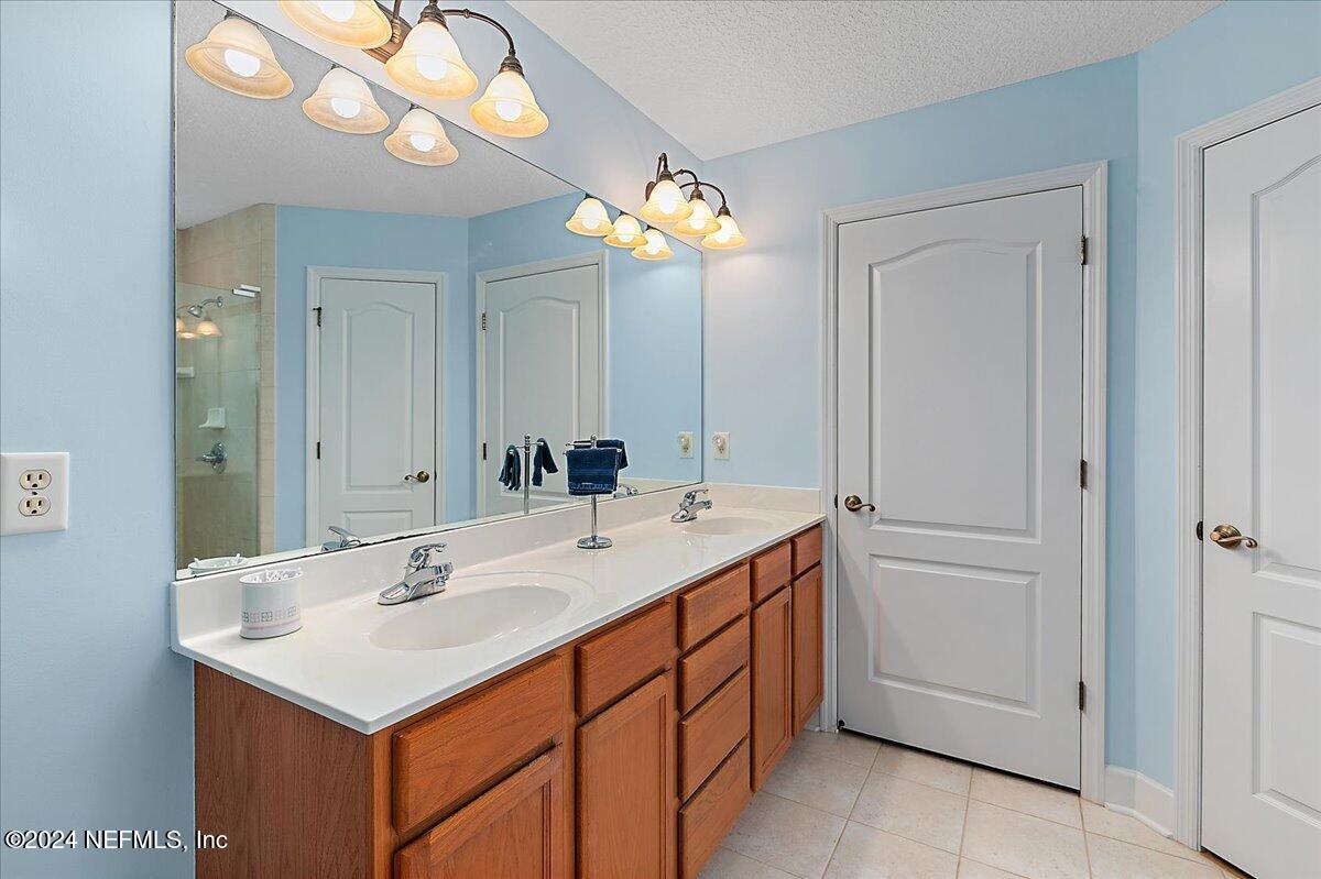9058 Butcher Road Glen St. Mary, FL 32040 - Photo 22 of 43 a bathroom with a sink and a mirror