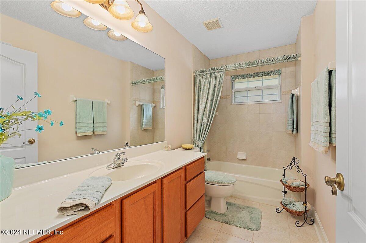 9058 Butcher Road Glen St. Mary, FL 32040 - Photo 29 of 43 a bathroom with a sink a toilet and shower