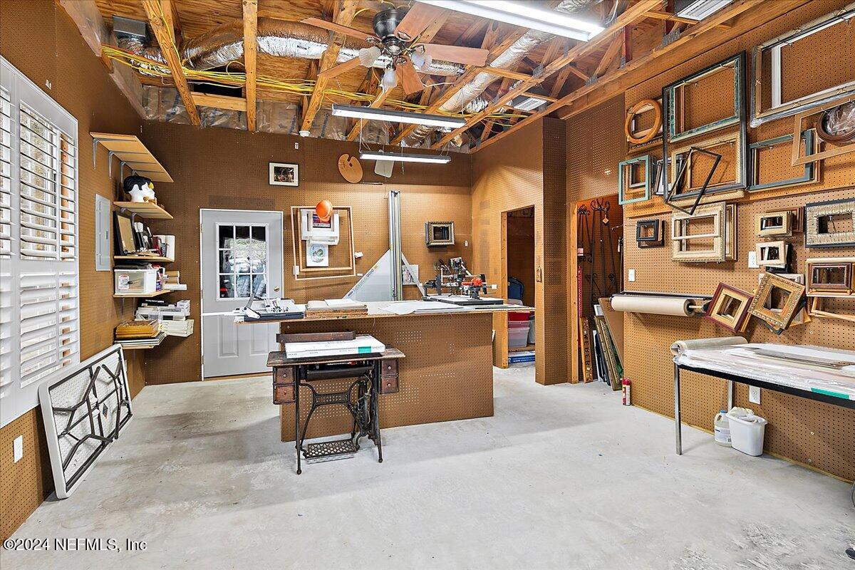 9058 Butcher Road Glen St. Mary, FL 32040 - Photo 35 of 43 a room with many tables and chairs