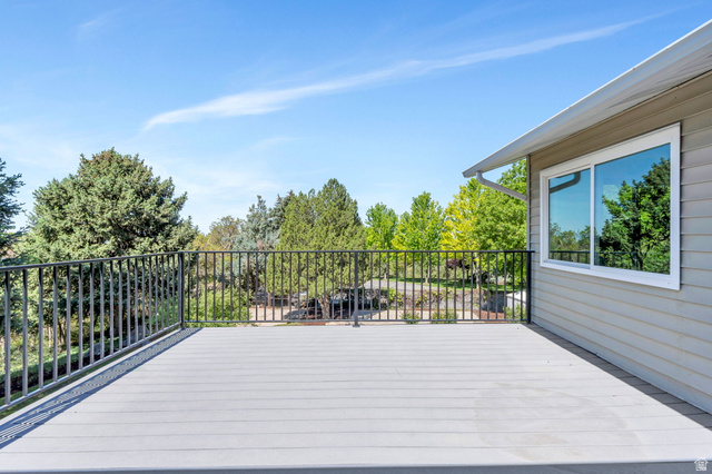 3813 North Foothill Drive Provo, UT 84604 - Photo 47 of 71 Expansive deck featuring composite decking and a black metal railing