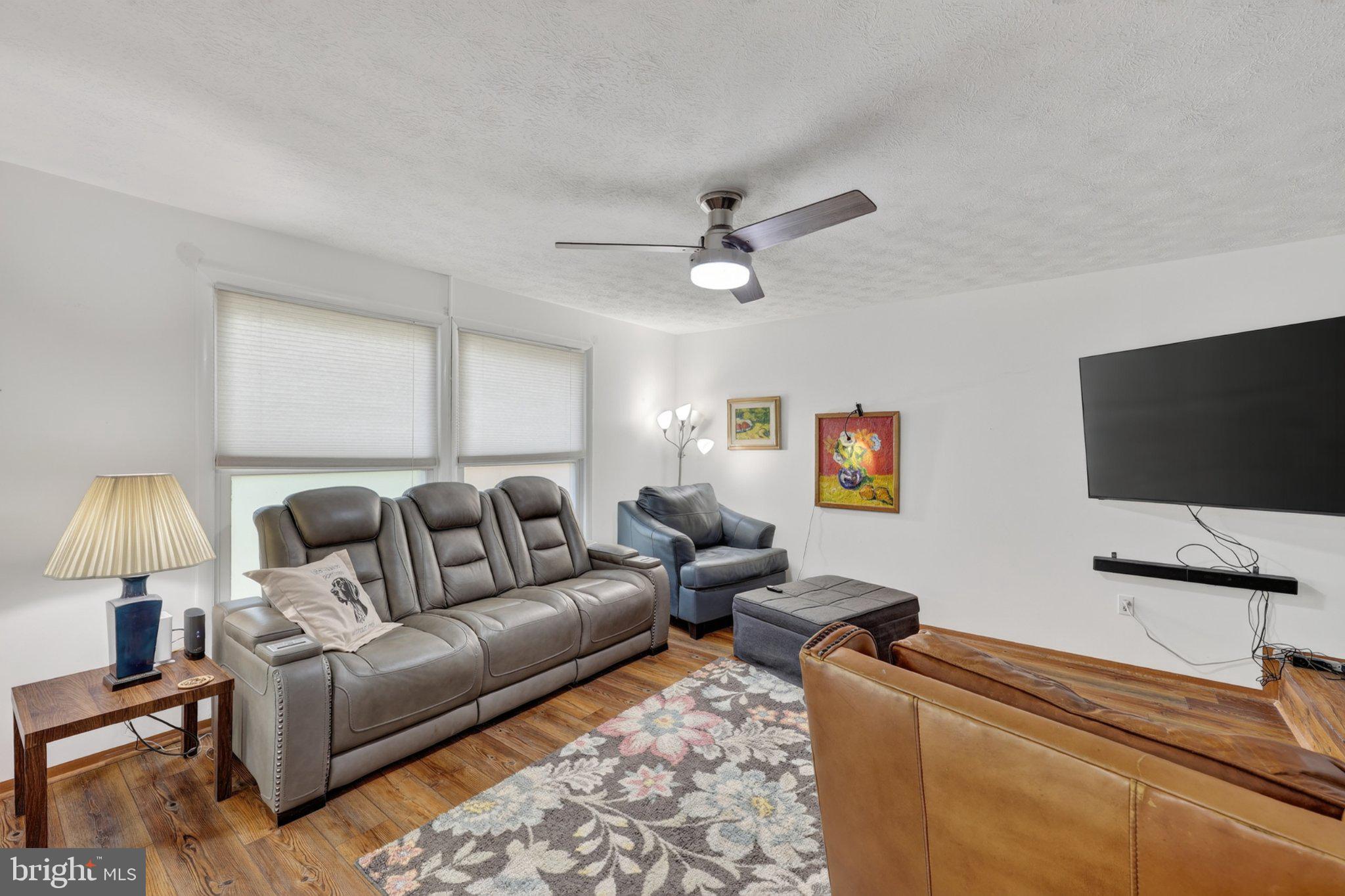 274 The Hill Road, Unit 13A Basye, VA 22810 - Photo 7 of 12 Cozy living space with modern charm.