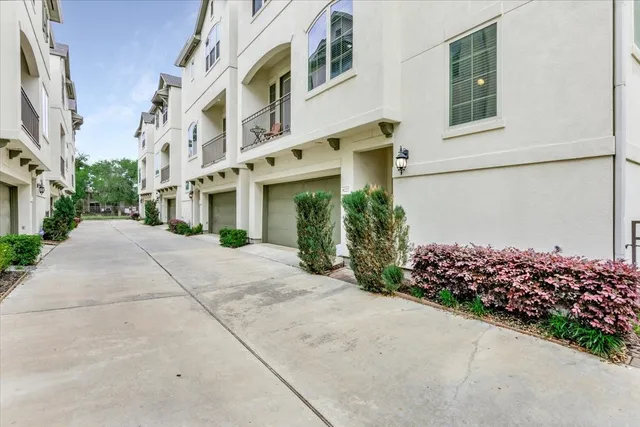 a view of a building with a yard