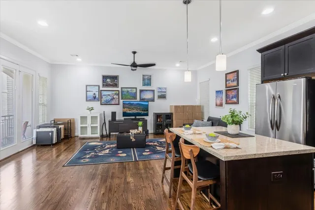 a view of a kitchen and dining room
