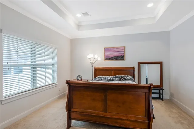 a view of a room with furniture and window